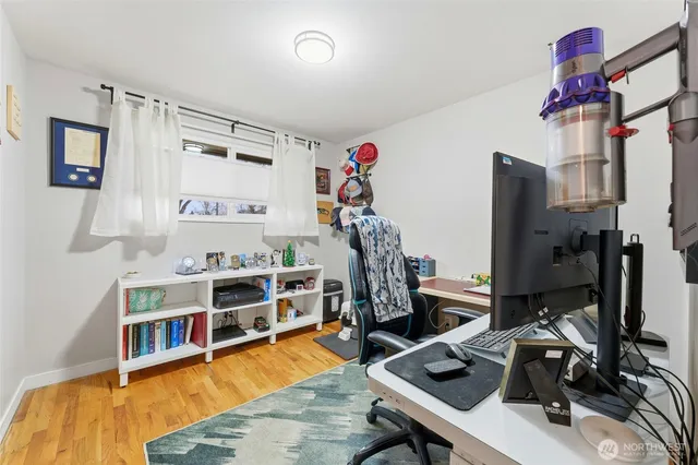 a view of a workspace with furniture and toys