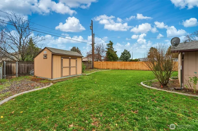 a view of backyard with green space