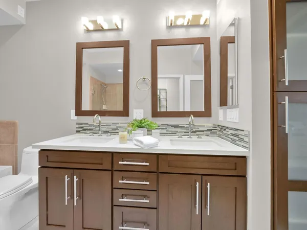 a bathroom with a sink and a mirror