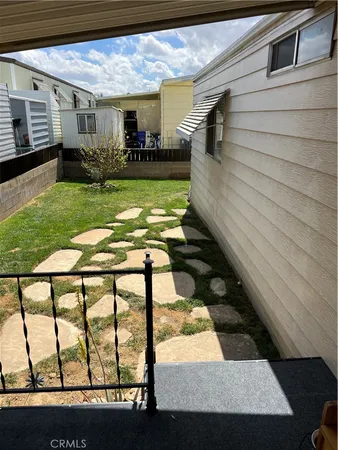 a view of swimming pool with seating area