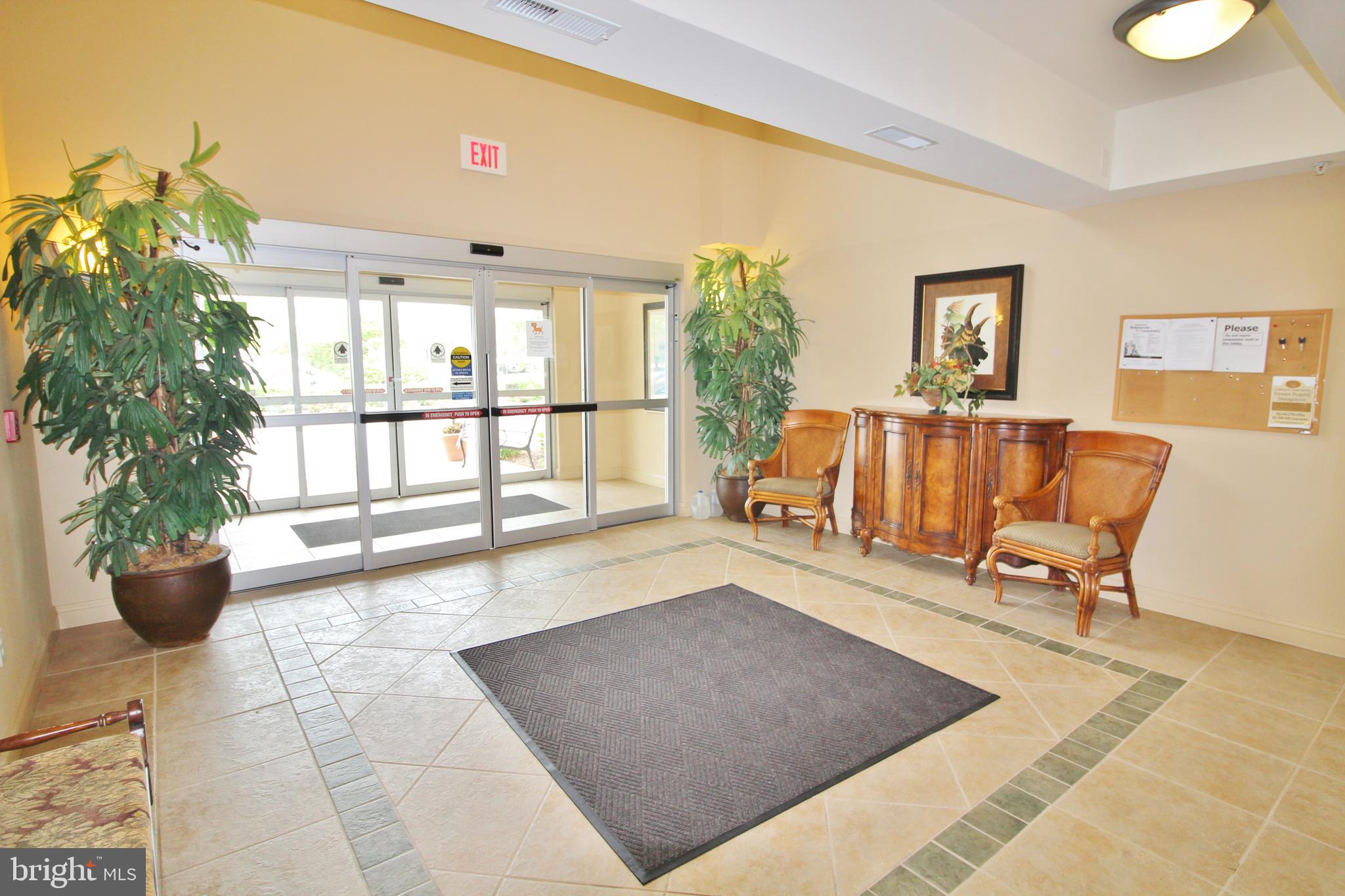 30619 Cedar Neck Road, Unit 1201 Ocean View, DE 19970 - Photo 29 of 30 Large secured lobby