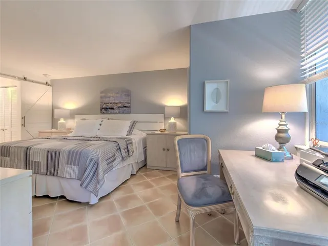 a bathroom with a double vanity sink and mirror