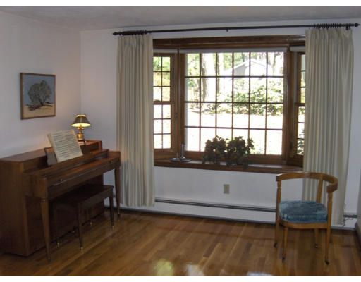 27 Downing Road Lexington, MA 02421 - Photo 3 of 11 a living room with furniture and a window