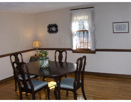 27 Downing Road Lexington, MA 02421 - Photo 5 of 11 a view of a dining room with furniture and window