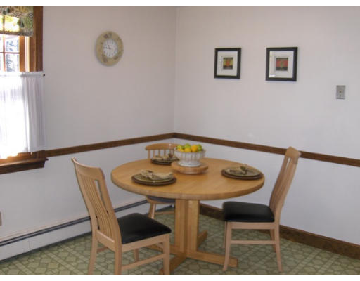27 Downing Road Lexington, MA 02421 - Photo 7 of 11 a view of a dining room with furniture