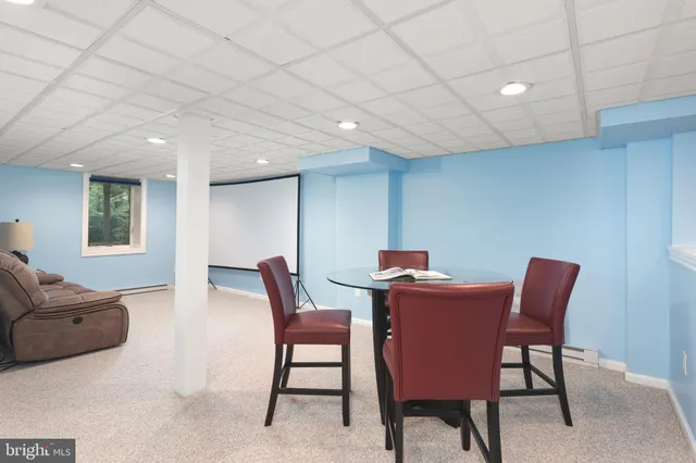 a workspace with furniture and window