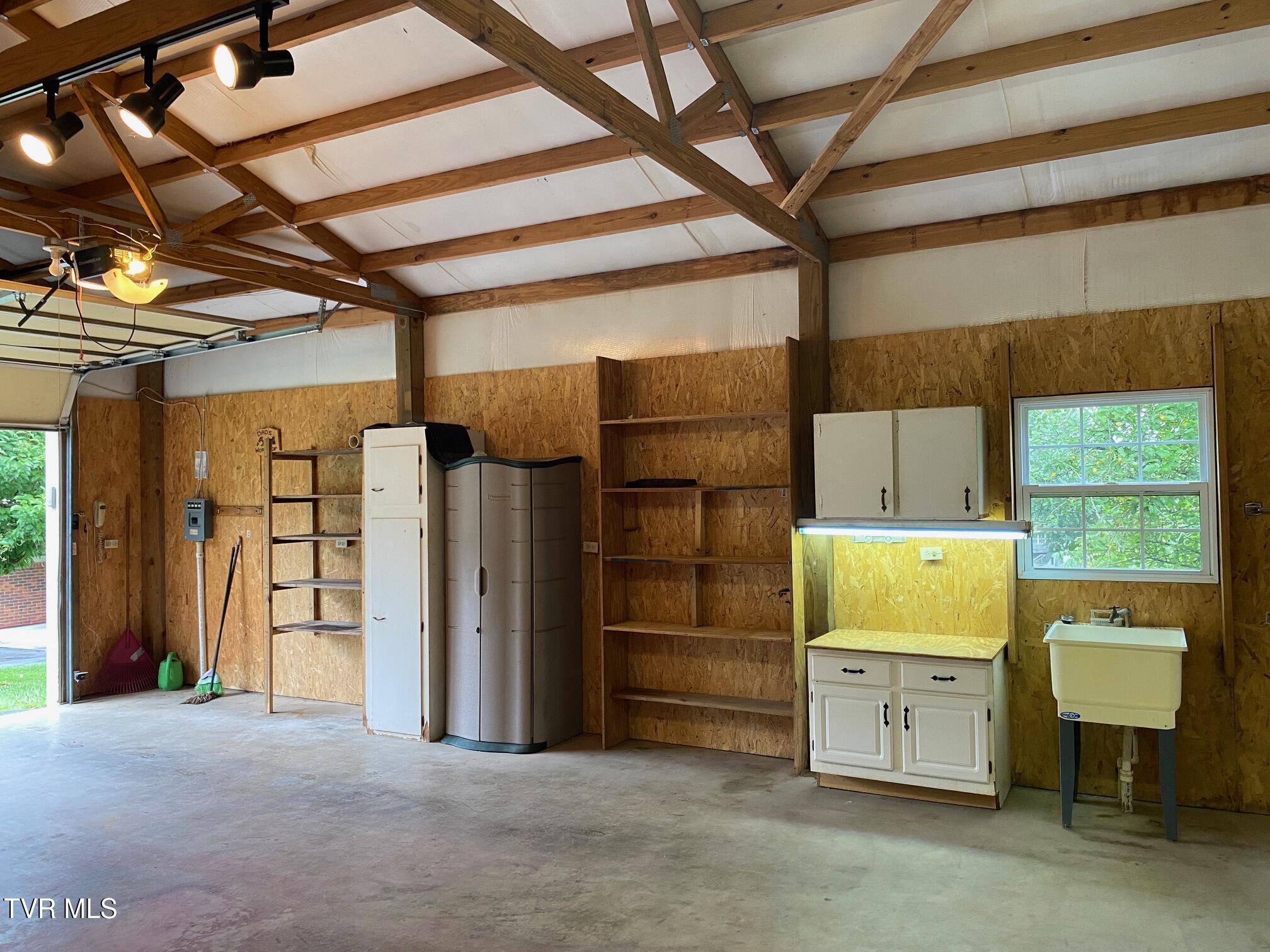3204 Marbleton Road Unicoi, TN 37692 - Photo 107 of 114 Garage cabinets and sink