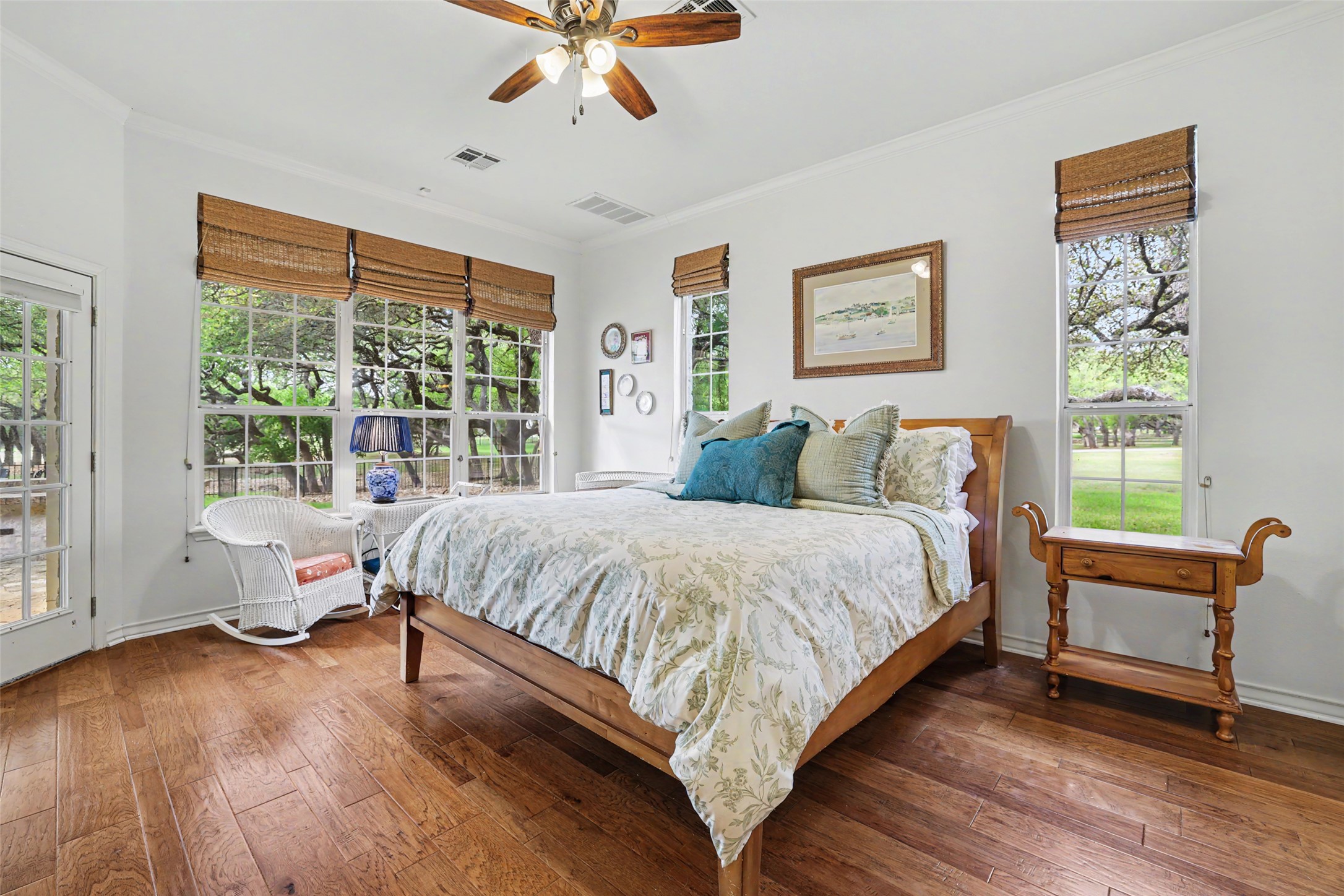 426 Logan Ranch Road Georgetown, TX 78628 - Photo 17 of 40 The primary bedroom is on the ground floor and has a door to the backyard area