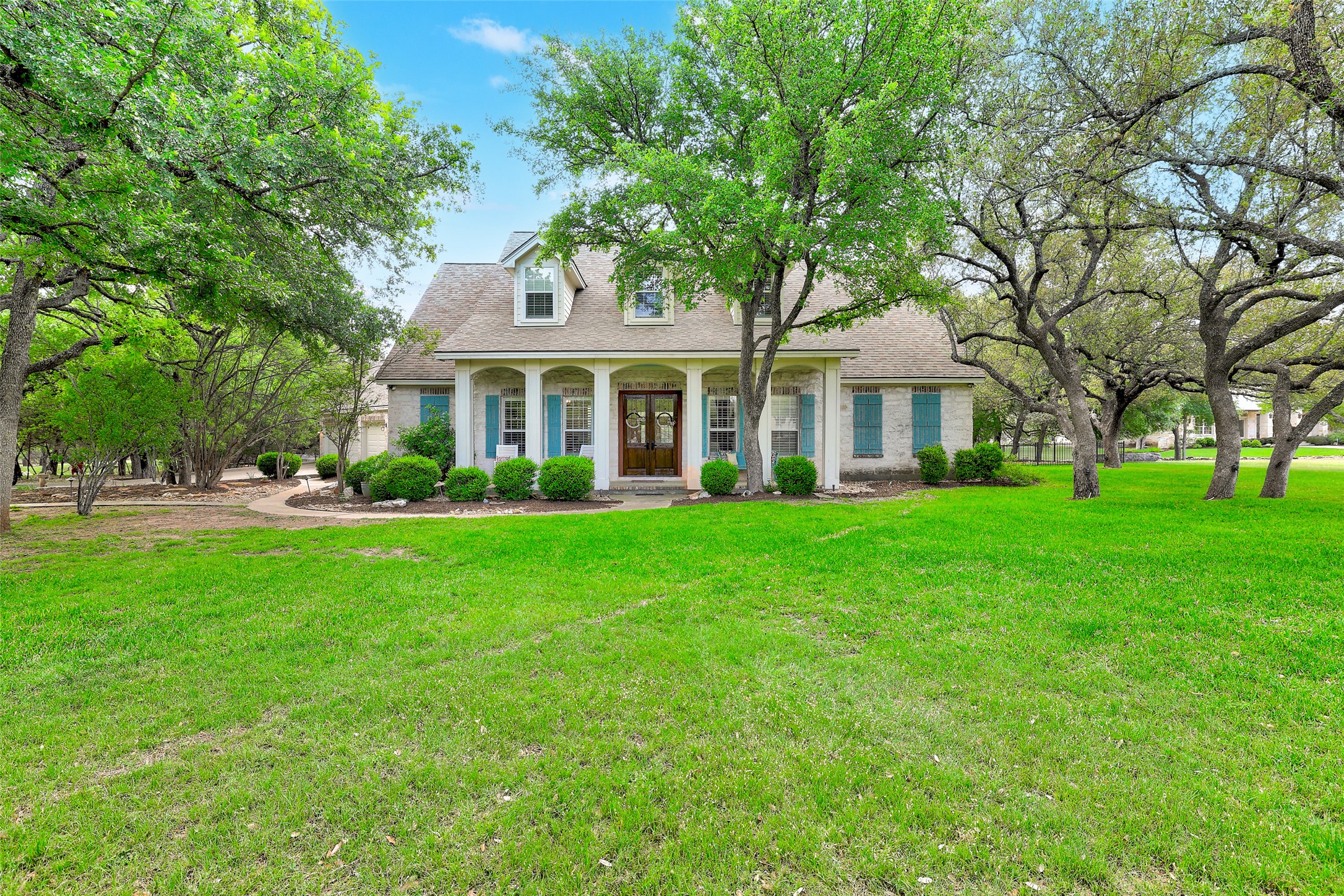426 Logan Ranch Road Georgetown, TX 78628 - Photo 2 of 40 Beautiful all sides stone two story home on gorgeous land