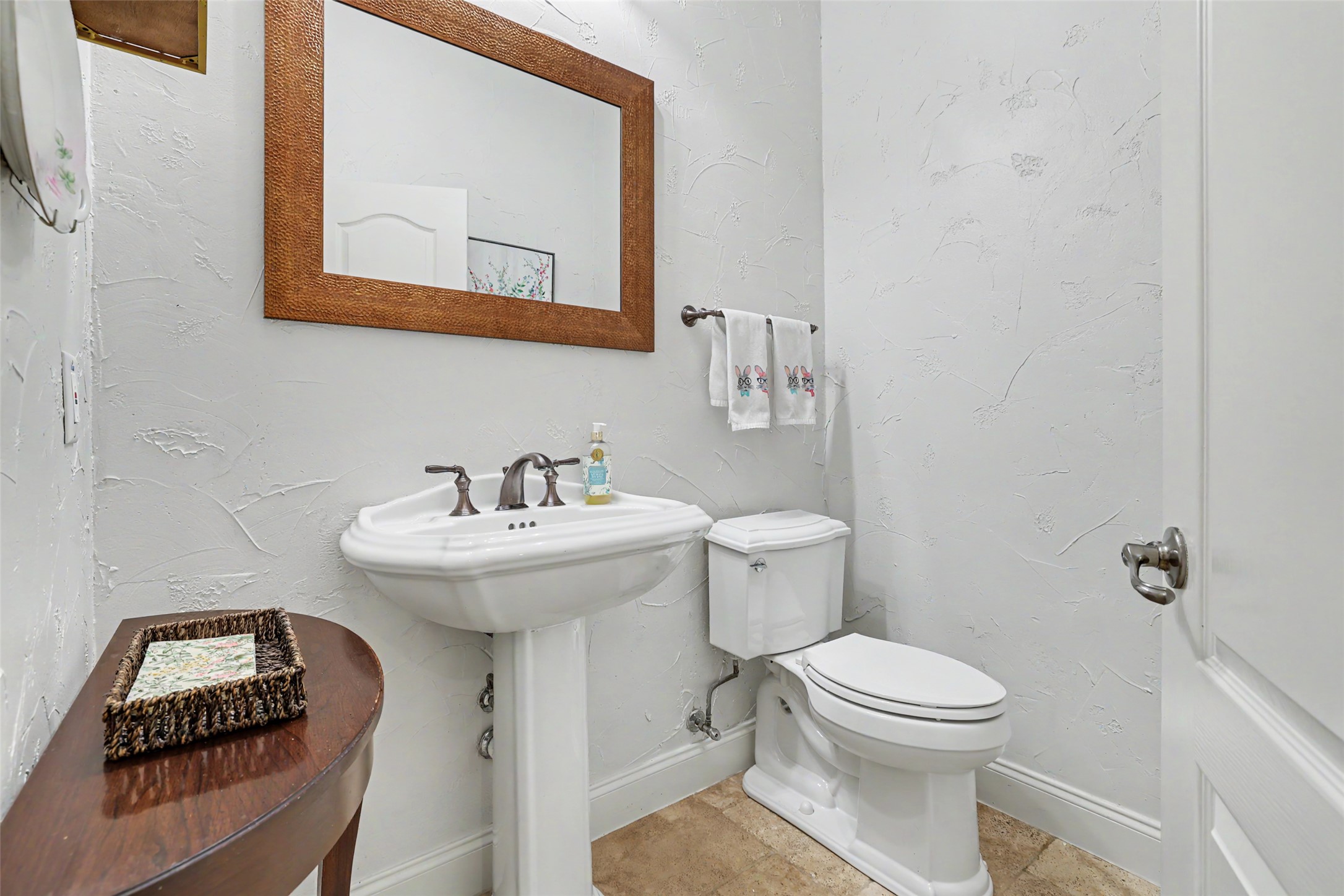 426 Logan Ranch Road Georgetown, TX 78628 - Photo 28 of 40 Half bath located downstairs for guest use.