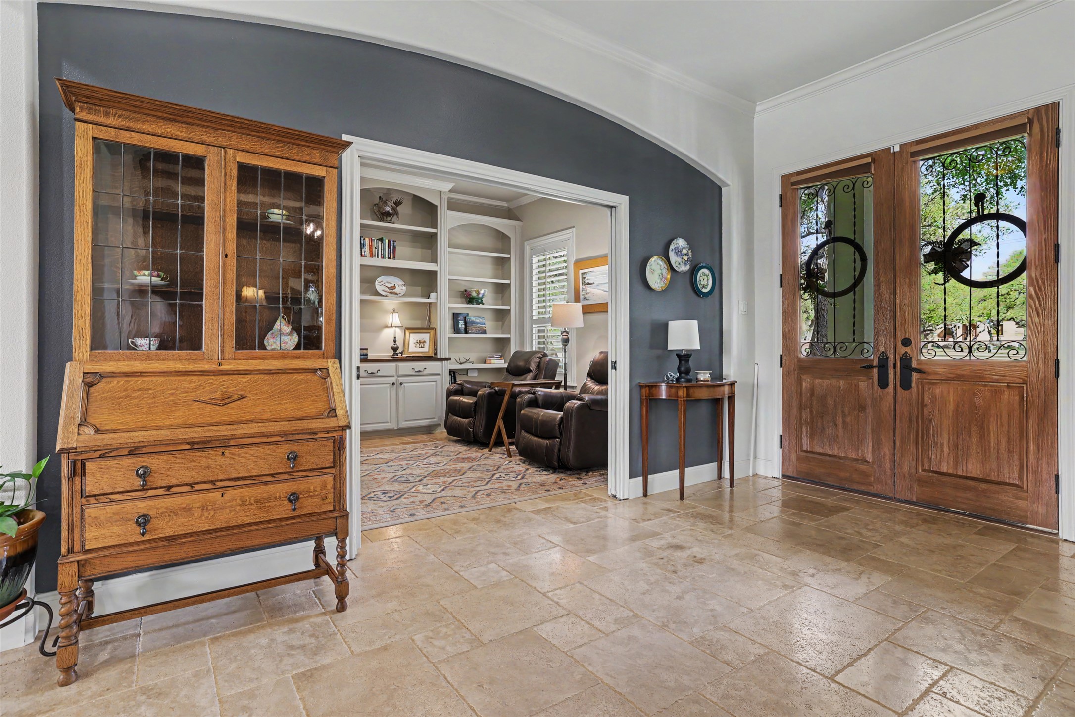 426 Logan Ranch Road Georgetown, TX 78628 - Photo 7 of 40 To the left of the entry is an office with hidden pocket doors