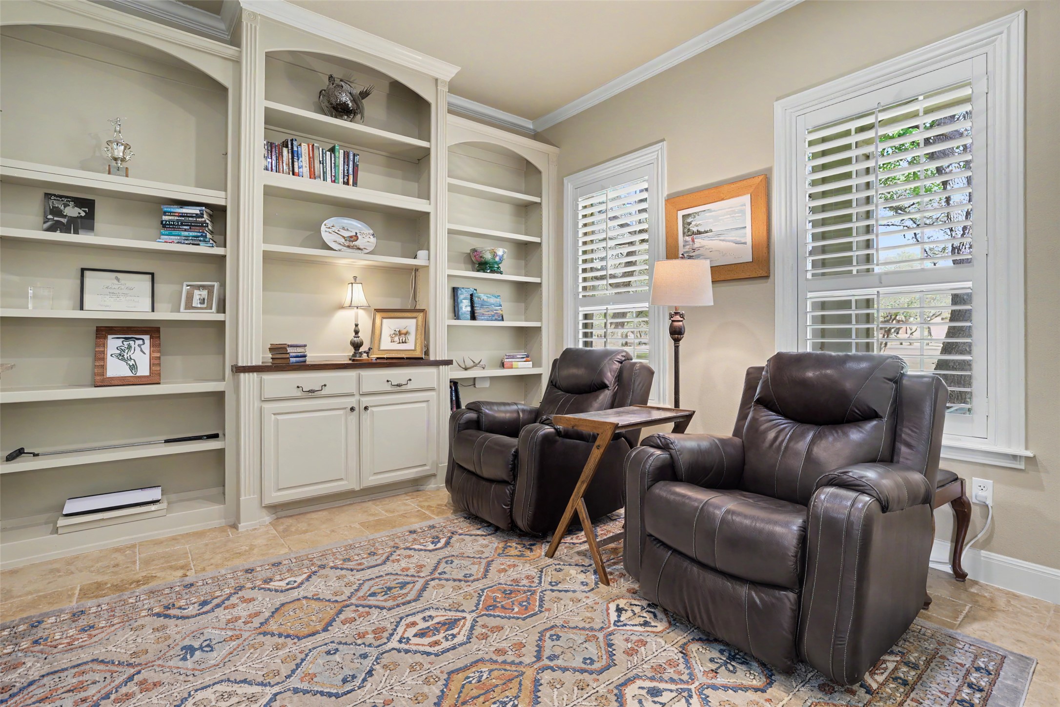 426 Logan Ranch Road Georgetown, TX 78628 - Photo 8 of 40 This is a quiet space with built in bookcases.