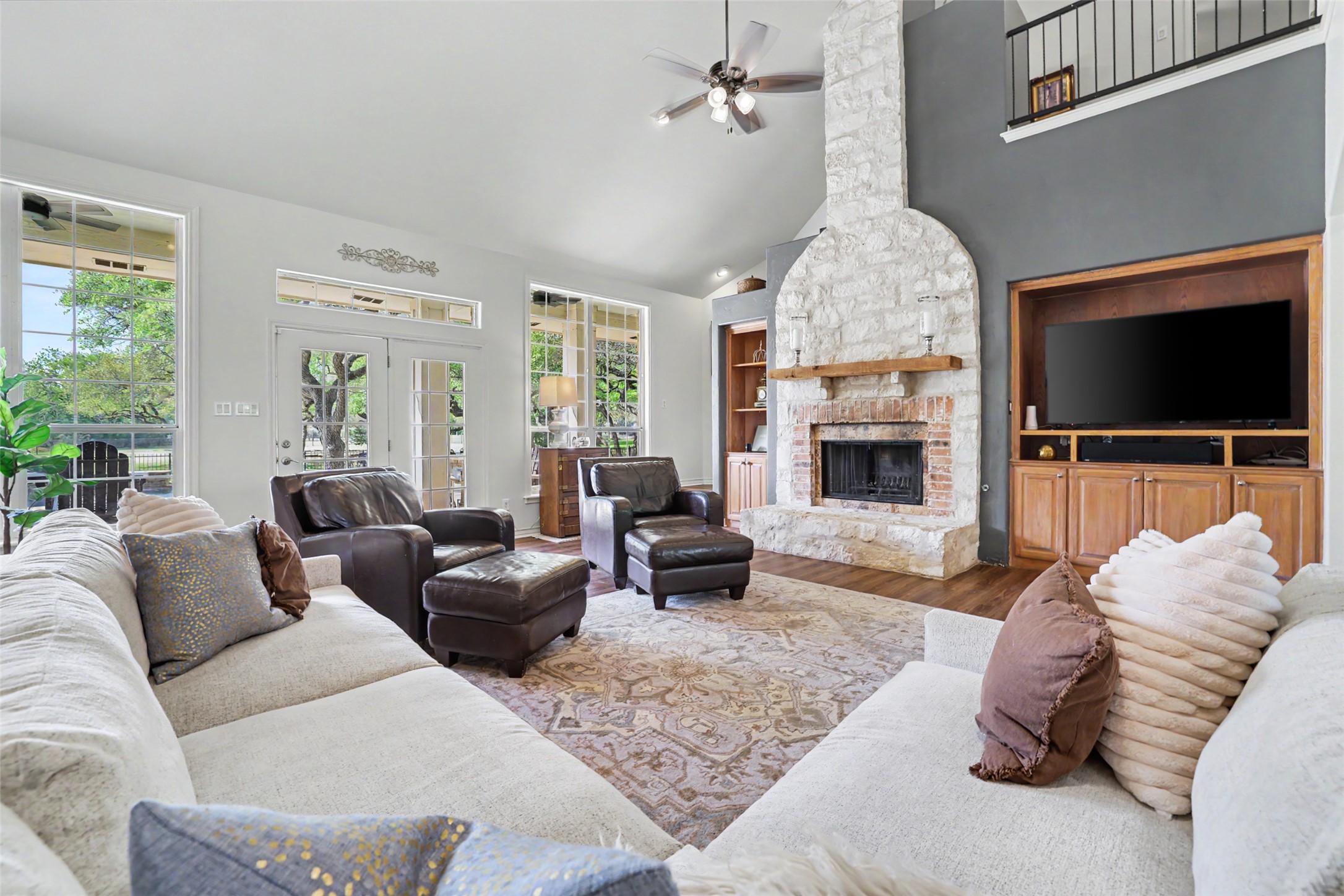 426 Logan Ranch Road Georgetown, TX 78628 - Photo 40 of 40 The open floor plan has a beautiful wood burning fireplace and built in cabinets for storage