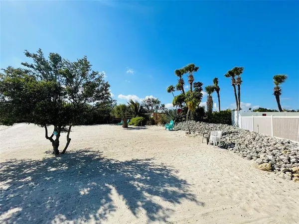 a view of a backyard of a house