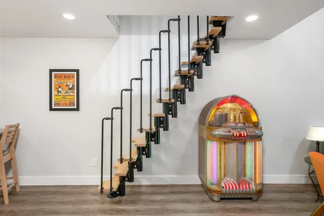 a view of a entryway door with wooden floor