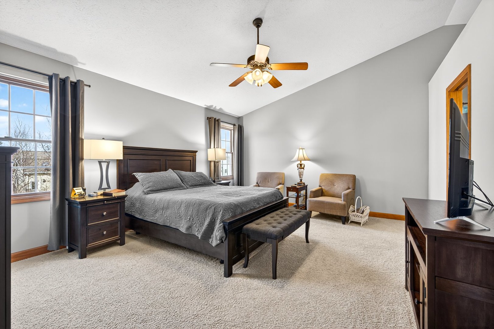 2968 Wolf Creek Lane Normal, IL 61761 - Photo 20 of 47 a bedroom with a bed and a chandelier
