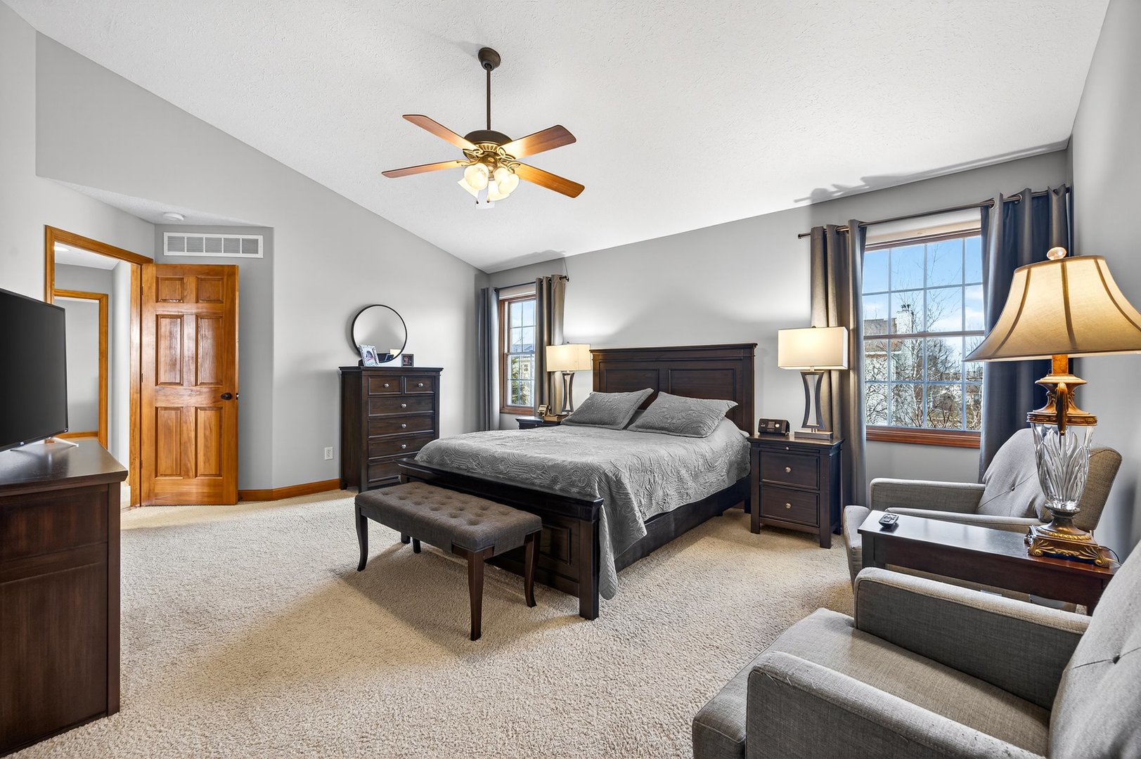 2968 Wolf Creek Lane Normal, IL 61761 - Photo 21 of 47 a bedroom with a bed and a chandelier