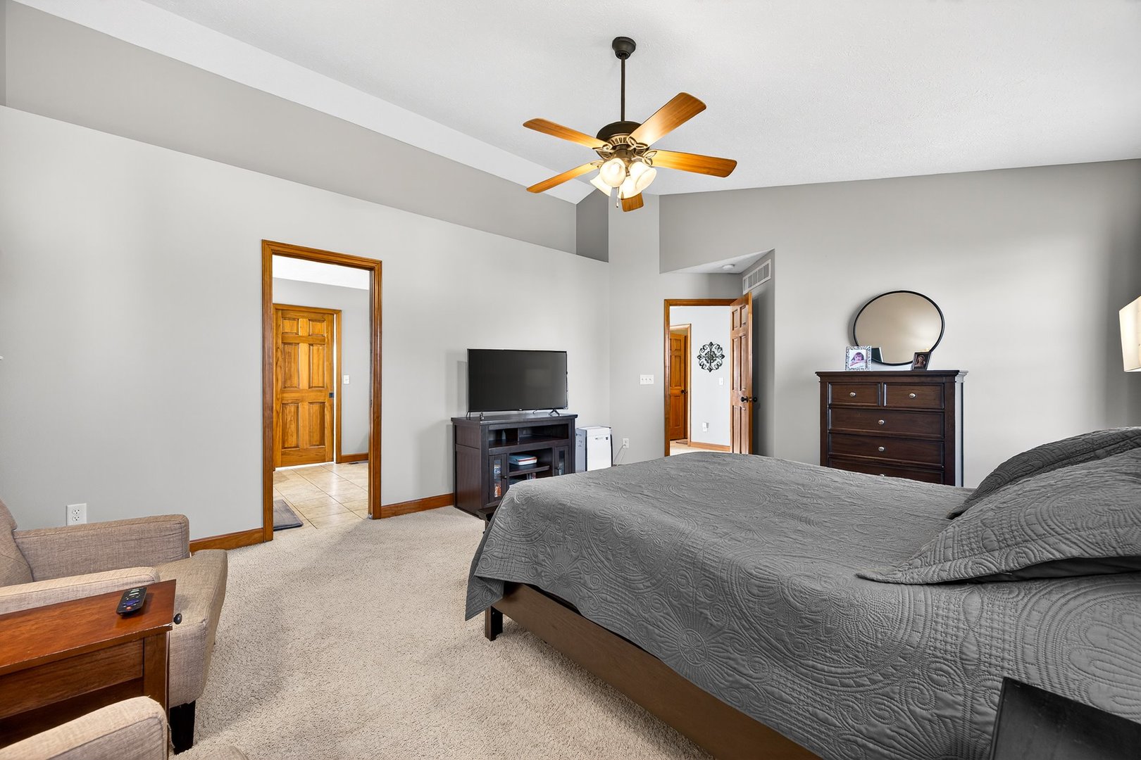 2968 Wolf Creek Lane Normal, IL 61761 - Photo 22 of 47 a bedroom with a bed and a flat screen tv