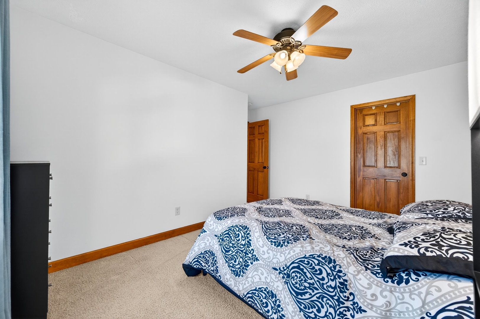 2968 Wolf Creek Lane Normal, IL 61761 - Photo 27 of 47 a bedroom with a bed and a chandelier
