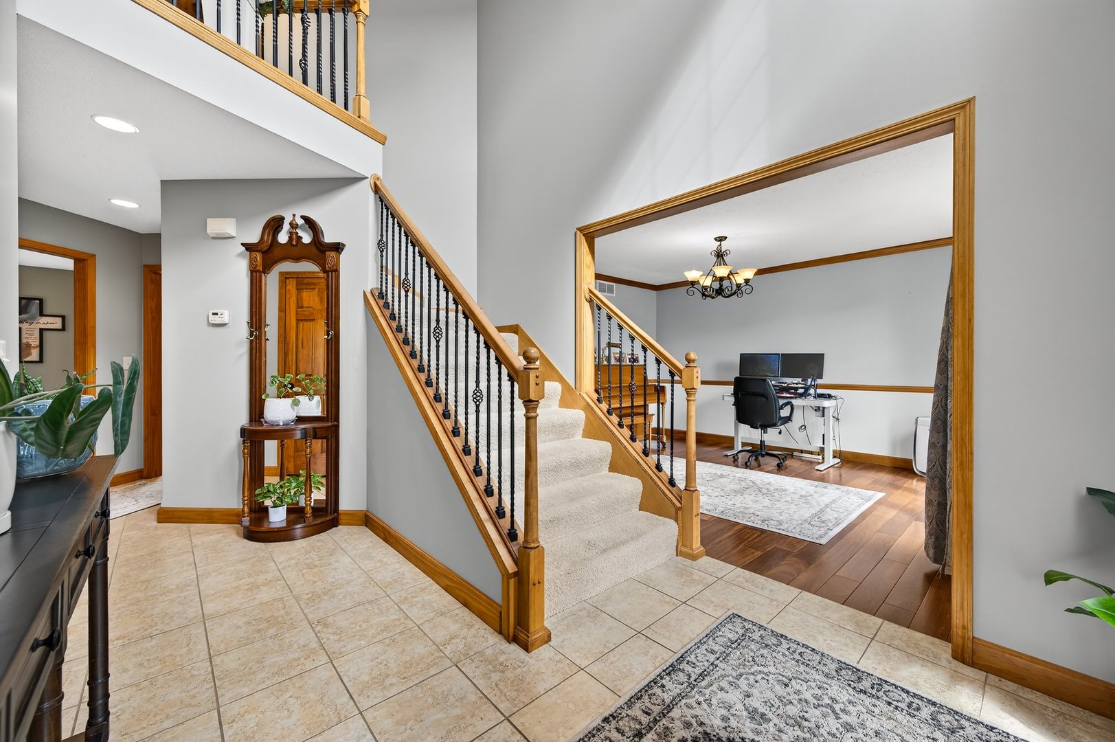 2968 Wolf Creek Lane Normal, IL 61761 - Photo 3 of 47 a view of entryway and hall with dining room