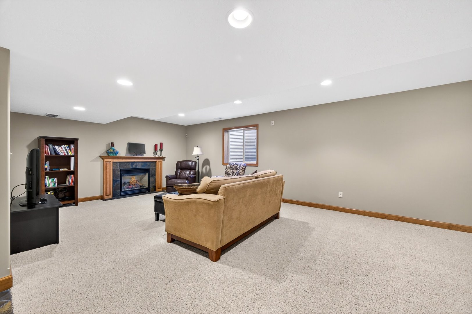 2968 Wolf Creek Lane Normal, IL 61761 - Photo 32 of 47 a living room with furniture and a flat screen tv