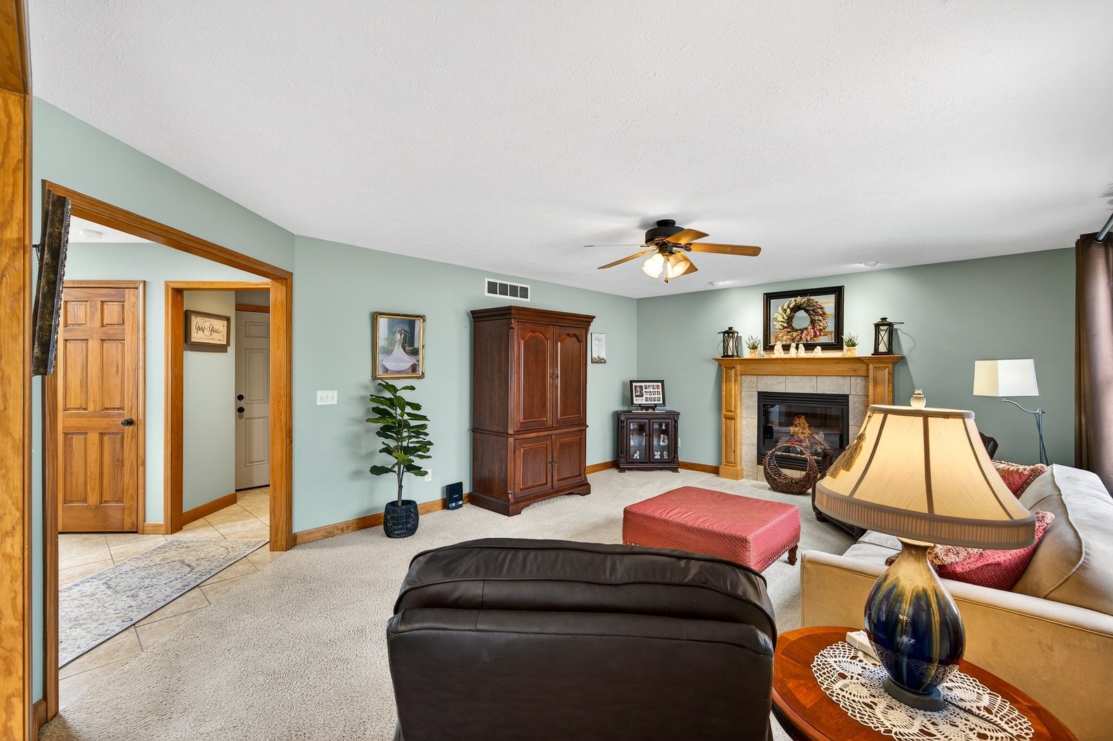 2968 Wolf Creek Lane Normal, IL 61761 - Photo 8 of 47 a living room with furniture and a fireplace