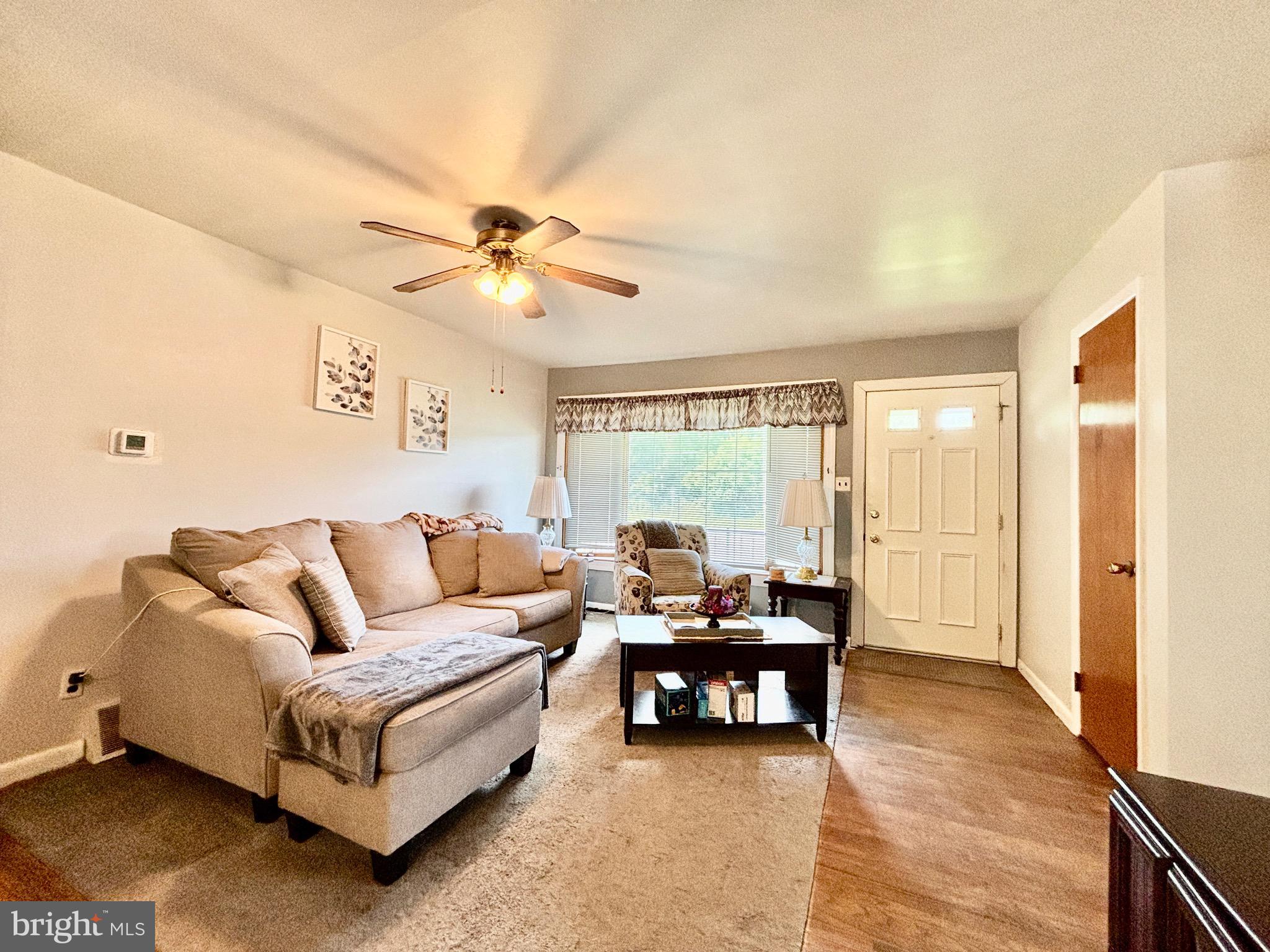 123 South Pemberton Road Pemberton, NJ 08068 - Photo 4 of 16 a living room with furniture and a large window