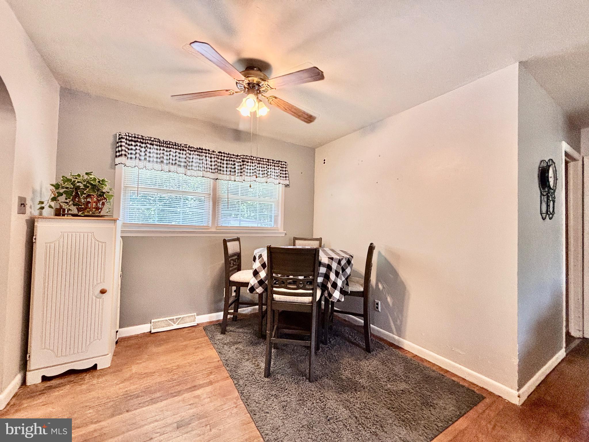 123 South Pemberton Road Pemberton, NJ 08068 - Photo 5 of 16 a dining room with wooden floor and a window
