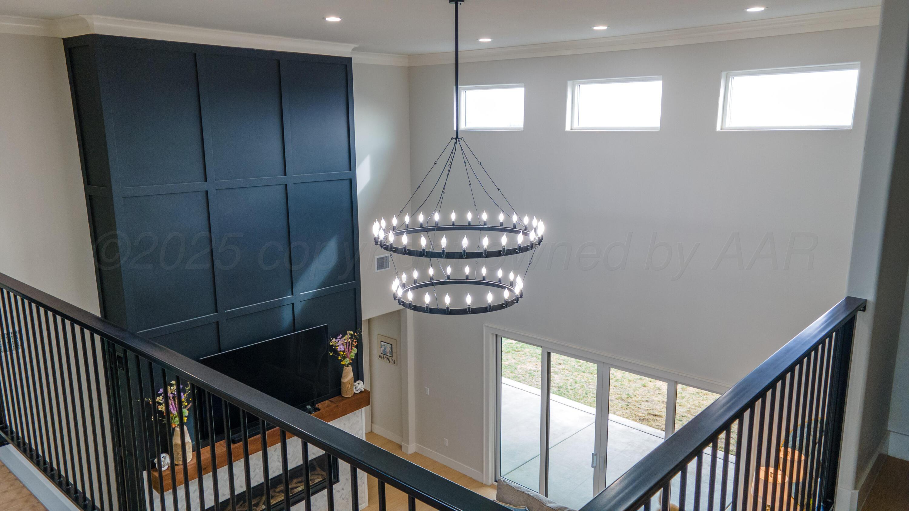 9507 Meadow Ridge Amarillo, TX 79118 - Photo 12 of 56 a view of entryway and hall with wooden floor