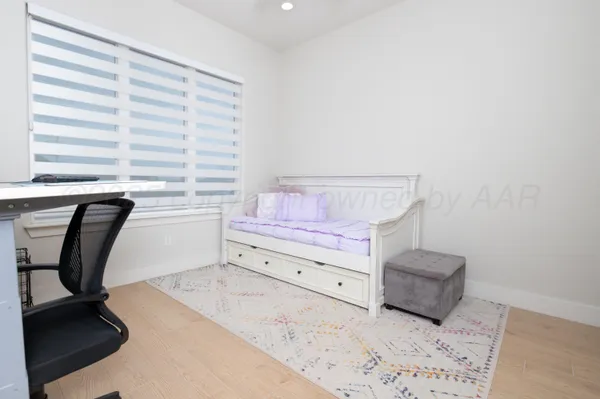 a kitchen with stainless steel appliances a sink and a refrigerator