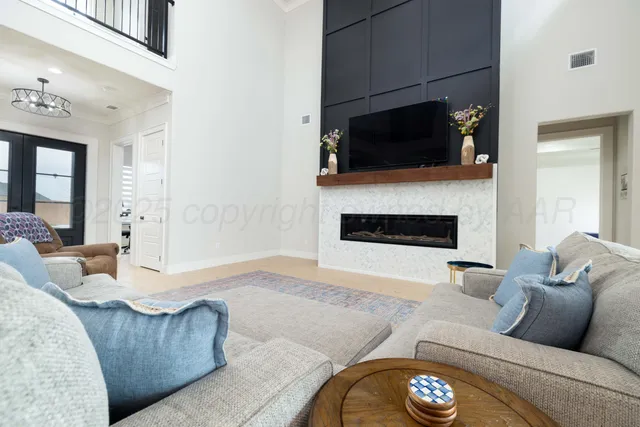 a kitchen with stainless steel appliances a refrigerator and cabinets