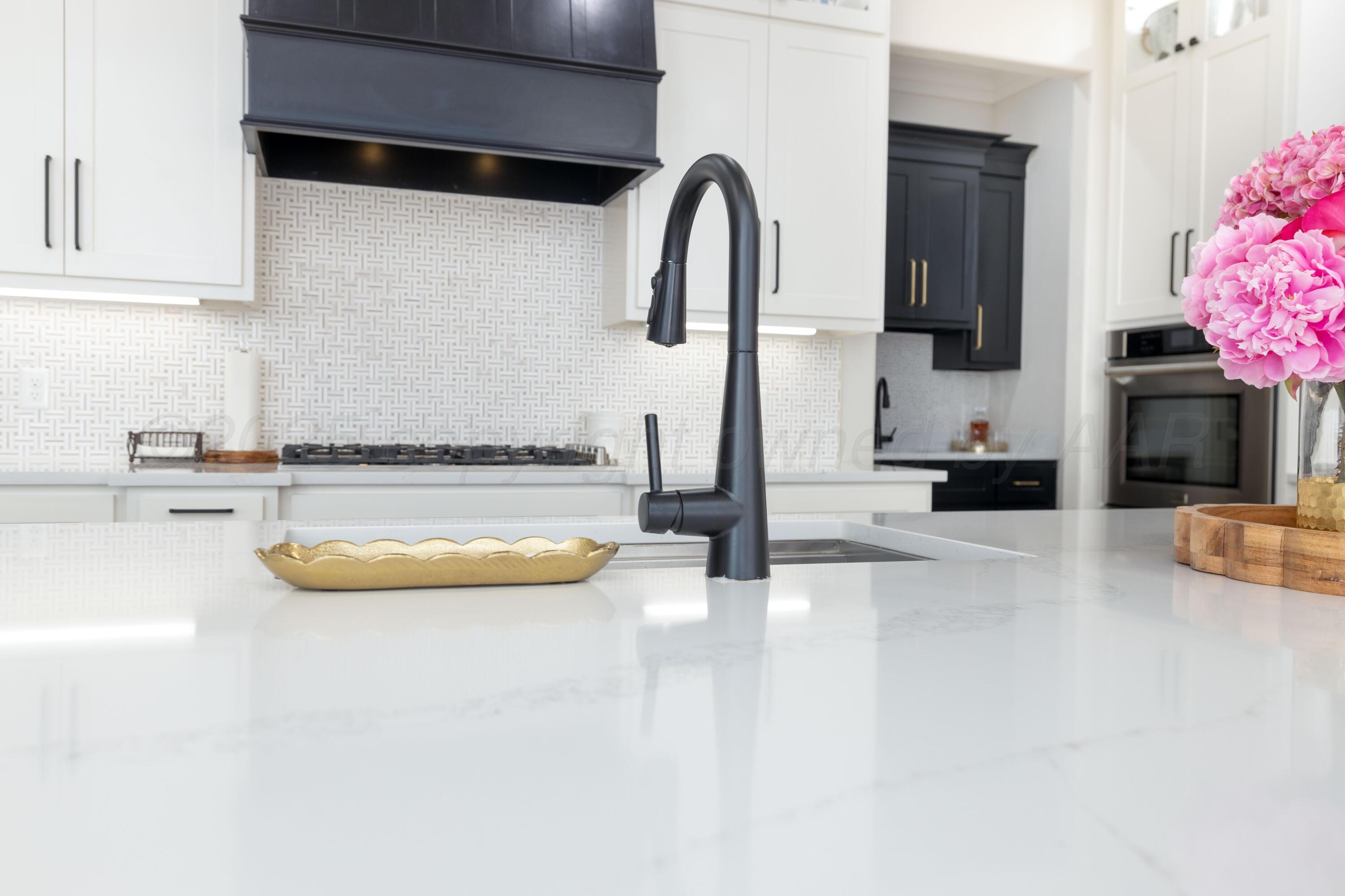 9507 Meadow Ridge Amarillo, TX 79118 - Photo 27 of 56 a bathroom with a sink and a bathtub