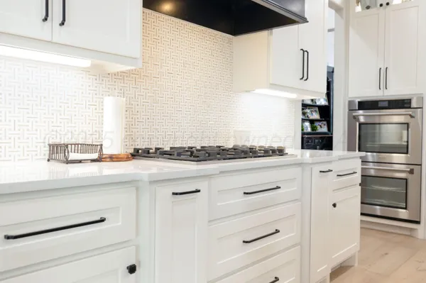 a bedroom with a bed dresser and a window