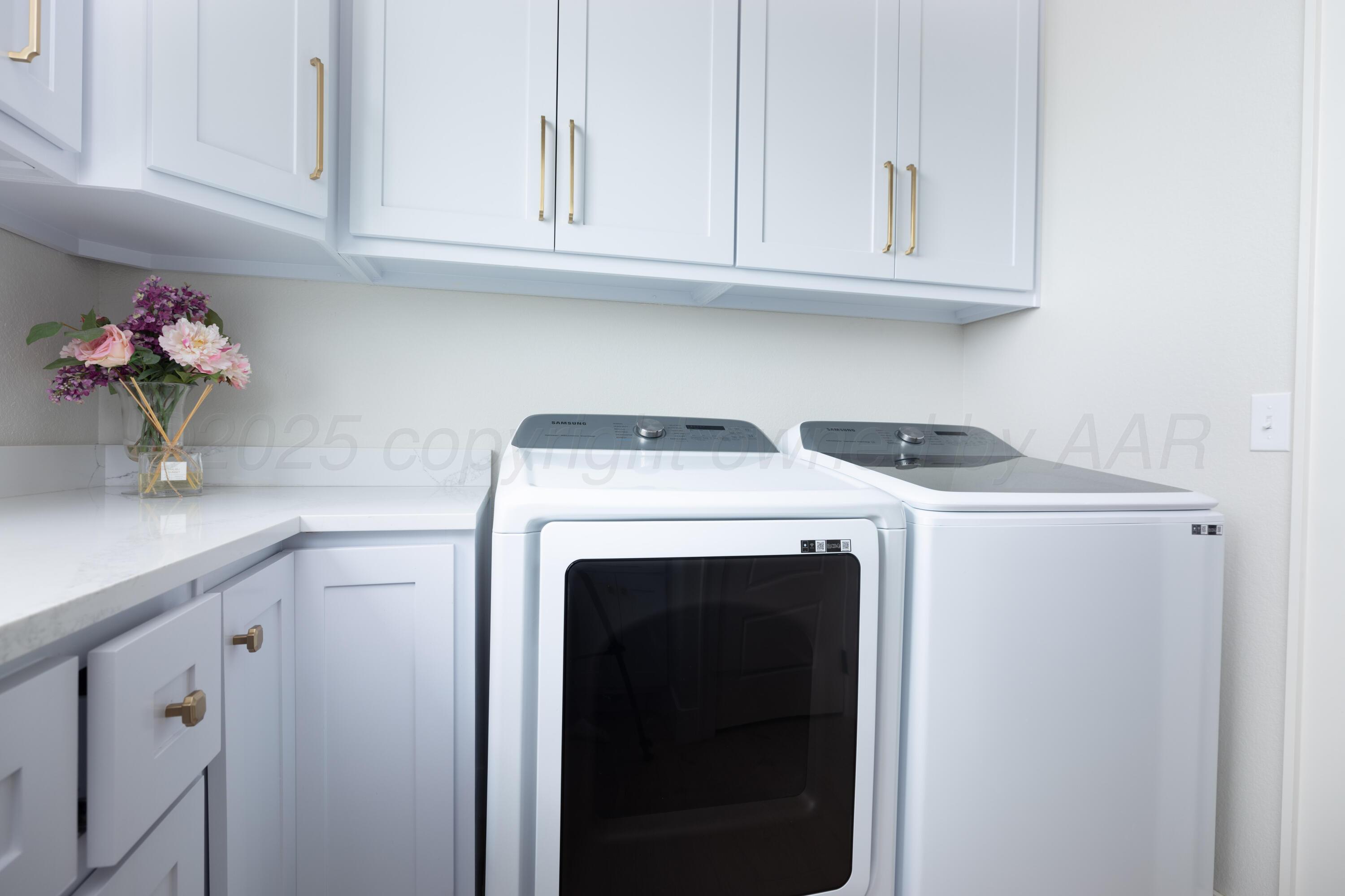 9507 Meadow Ridge Amarillo, TX 79118 - Photo 37 of 56 a view of washer and dryer