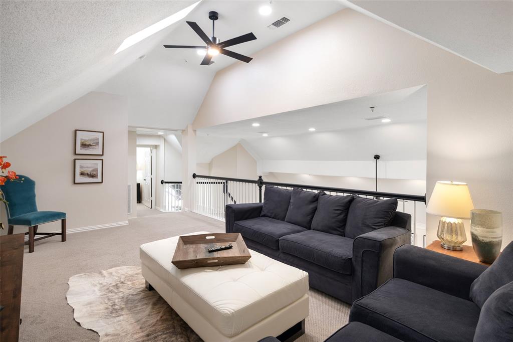 14604 Hemingway Court Addison, TX 75001 - Photo 15 of 27 a living room with furniture and a lamp