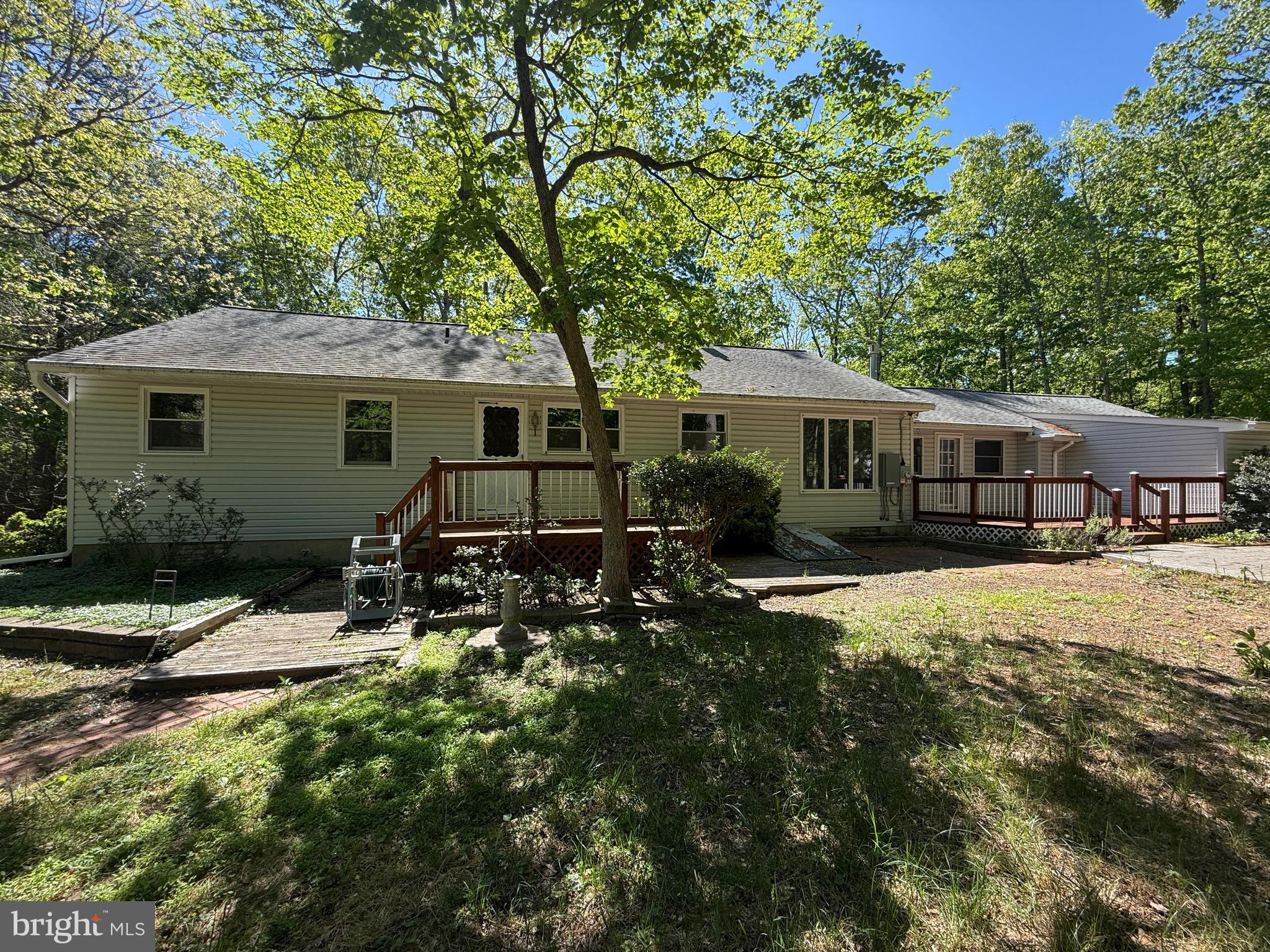 229 Oakshade Road Tabernacle, NJ 08088 - Photo 16 of 57 a view of house with yard and sitting area