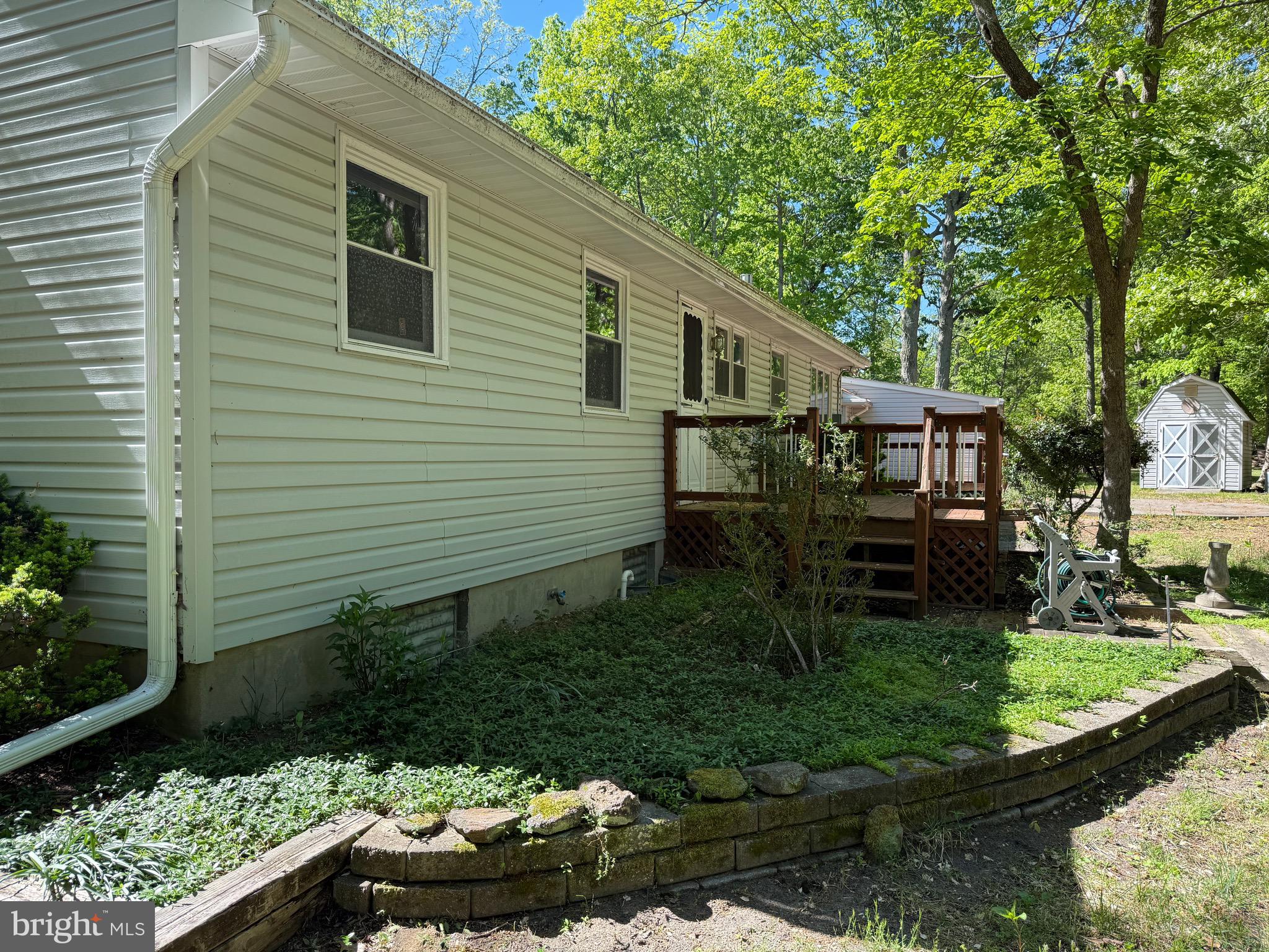 229 Oakshade Road Tabernacle, NJ 08088 - Photo 18 of 57 a view of a house with backyard and sitting area