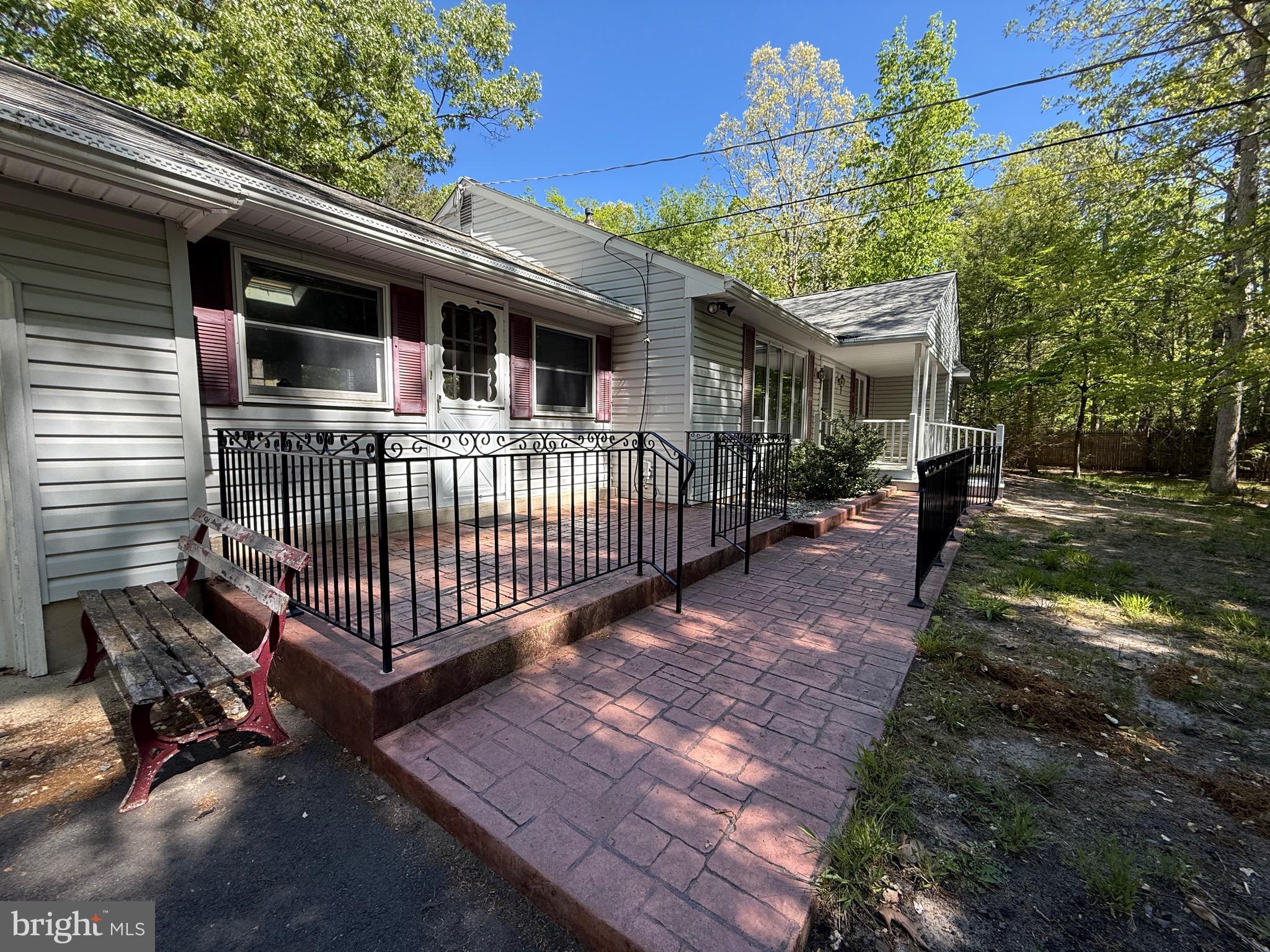 229 Oakshade Road Tabernacle, NJ 08088 - Photo 2 of 57 a view of a house with backyard and sitting area