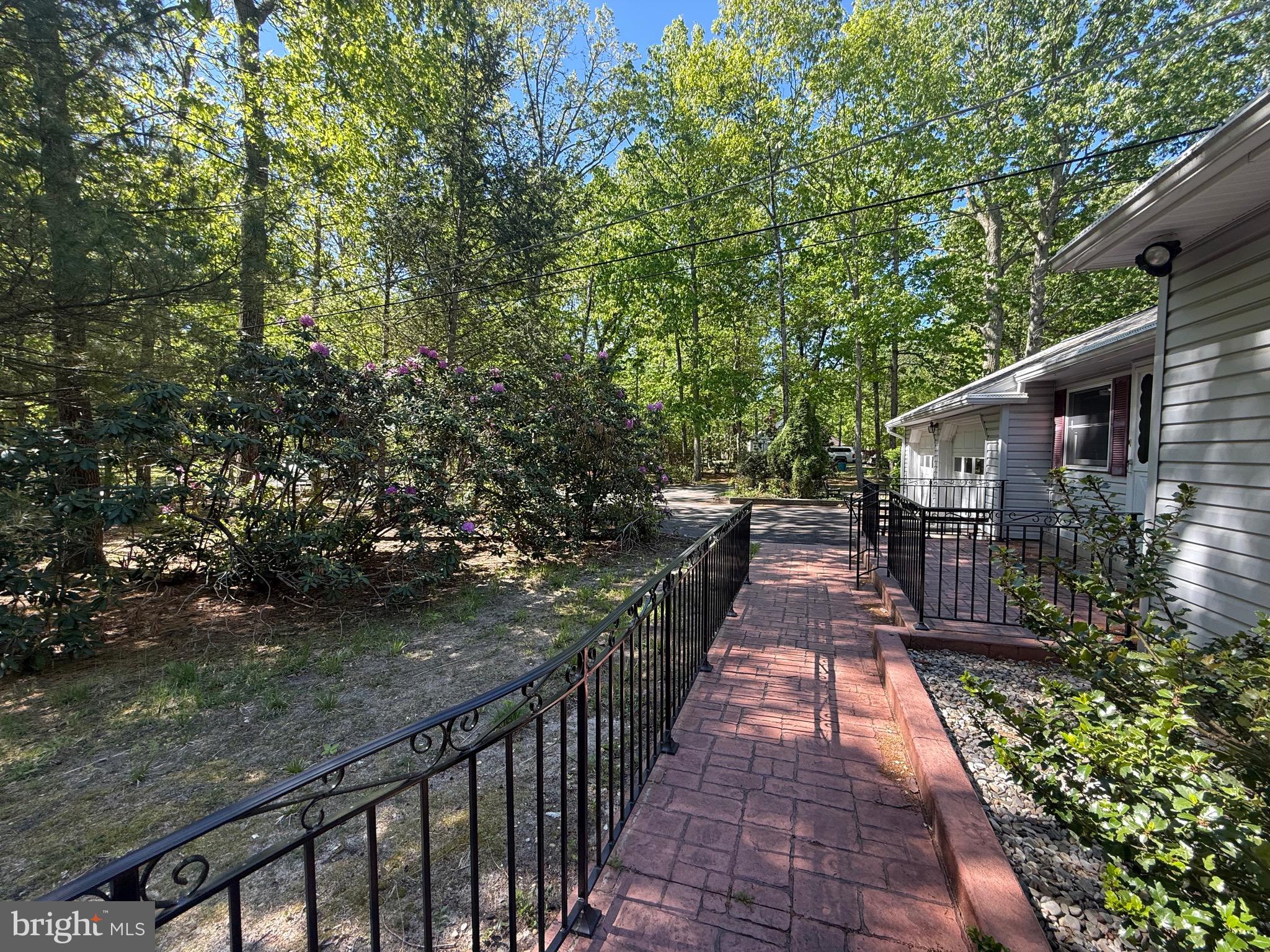 229 Oakshade Road Tabernacle, NJ 08088 - Photo 10 of 57 a view of a pathway of a house with wooden floor