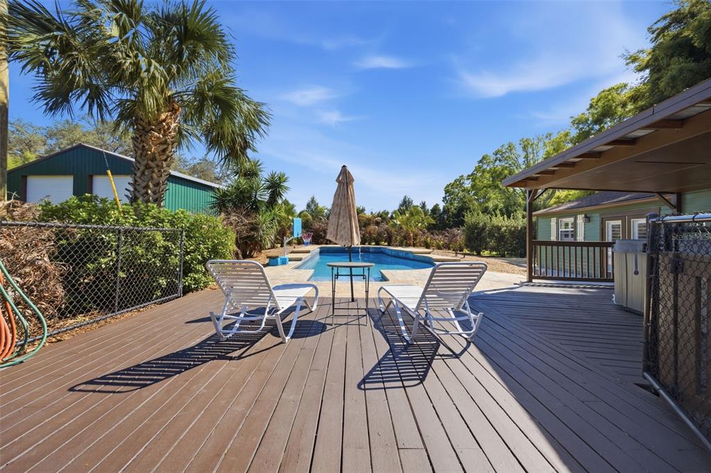 3752 Old Keystone Road Tarpon Springs, FL 34688 - Photo 41 of 71 a view of a patio with wooden floor