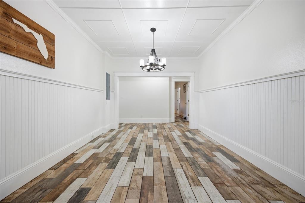 3752 Old Keystone Road Tarpon Springs, FL 34688 - Photo 6 of 71 a view of a room with wooden floor fan and window