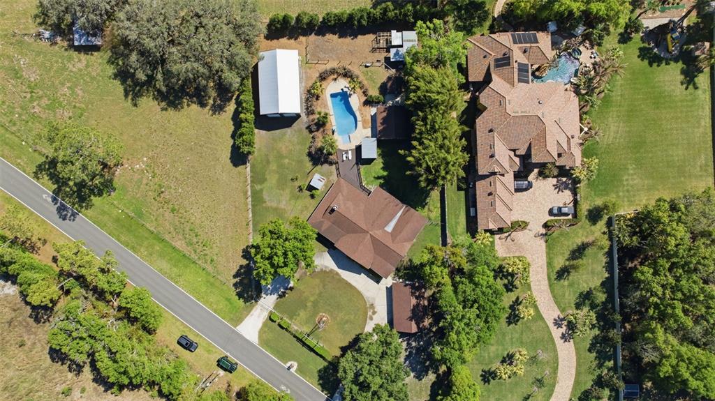 3752 Old Keystone Road Tarpon Springs, FL 34688 - Photo 69 of 71 an aerial view of residential houses with outdoor space