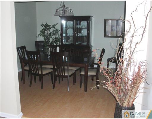 39 Haypress Road Dayton, NJ 08810 - Photo 6 of 11 a view of a dining room with furniture and chandelier