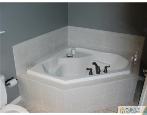 39 Haypress Road Dayton, NJ 08810 - Photo 10 of 11 a bathroom with a sink