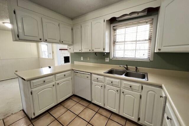 406 Spring Lane Destin, FL 32541 - Photo 14 of 25 a kitchen with cabinets appliances a sink and a window