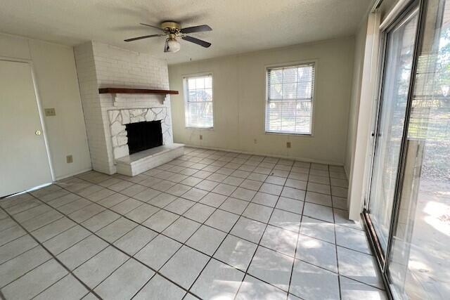 406 Spring Lane Destin, FL 32541 - Photo 16 of 25 a view of an empty room with a fireplace and a window