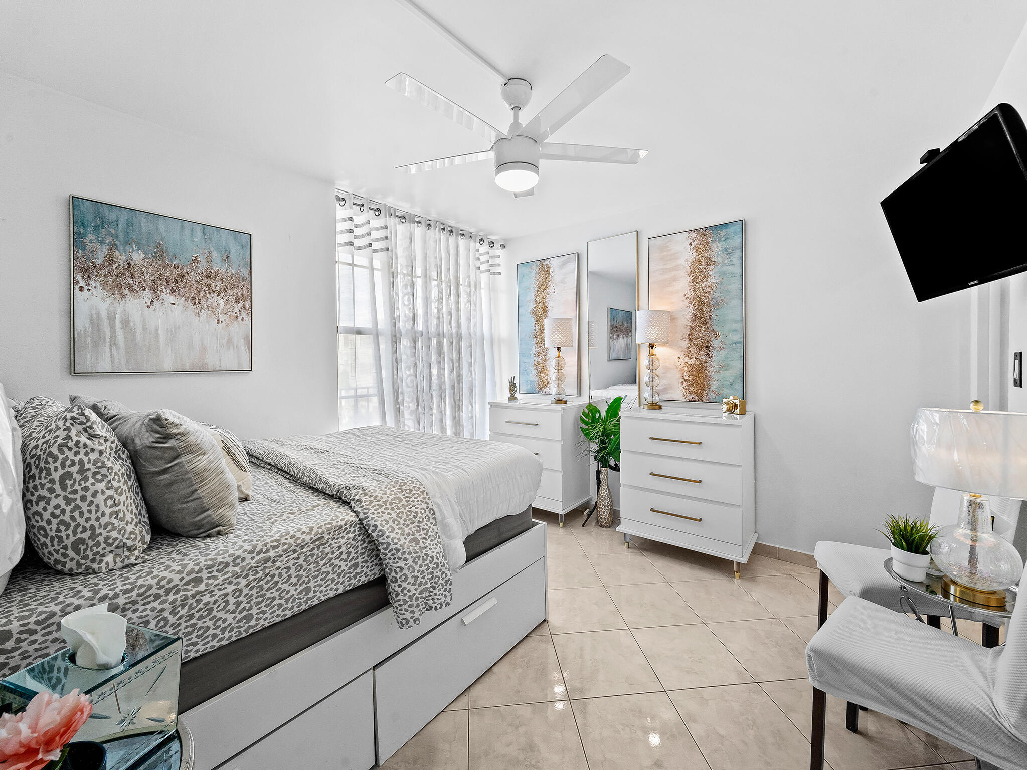 13 Royal Palm Way, Unit 5030 Boca Raton, FL 33432 - Photo 12 of 15 a bedroom with a bed and furniture