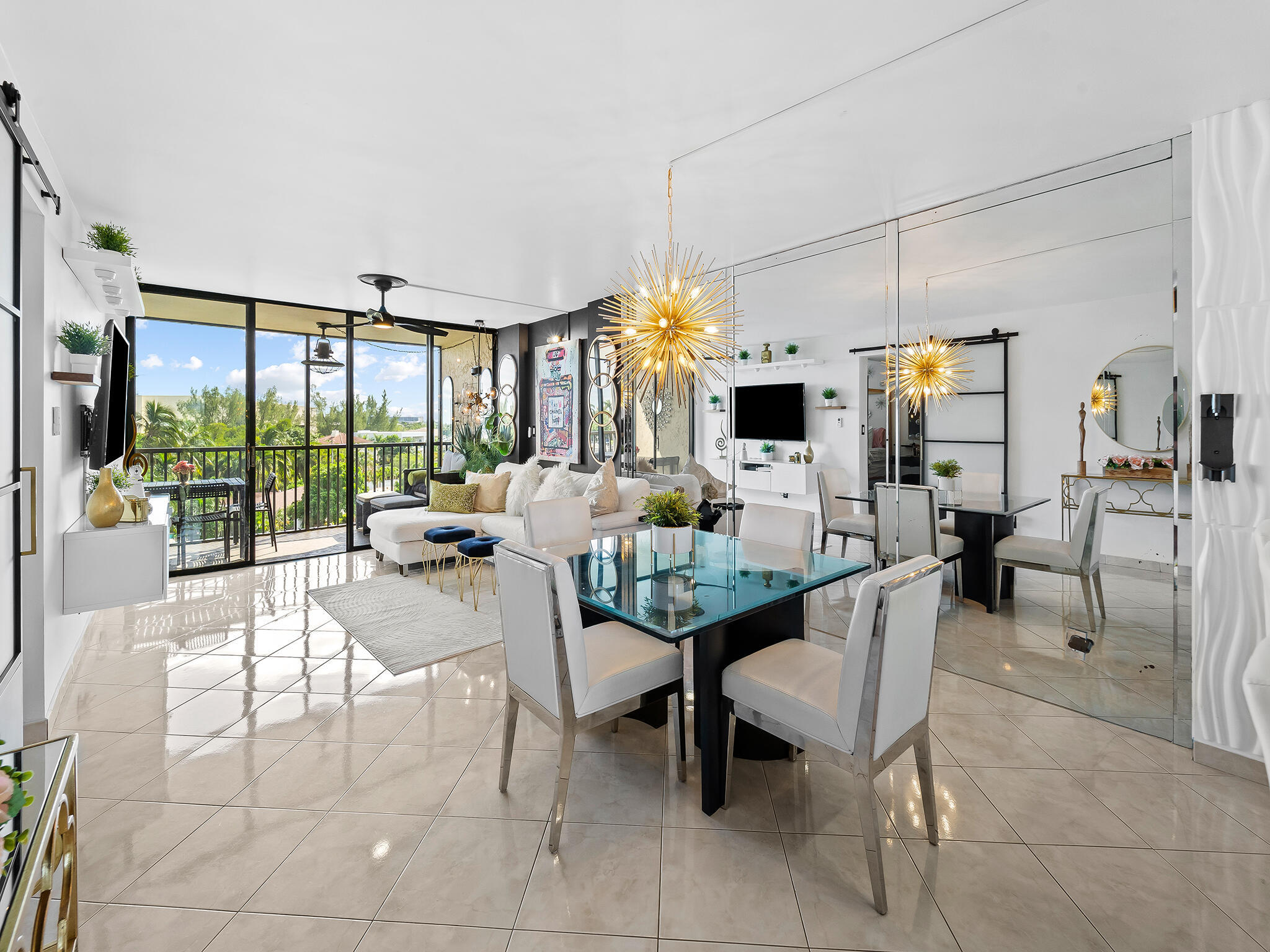 13 Royal Palm Way, Unit 5030 Boca Raton, FL 33432 - Photo 8 of 15 a living room with furniture and a large window