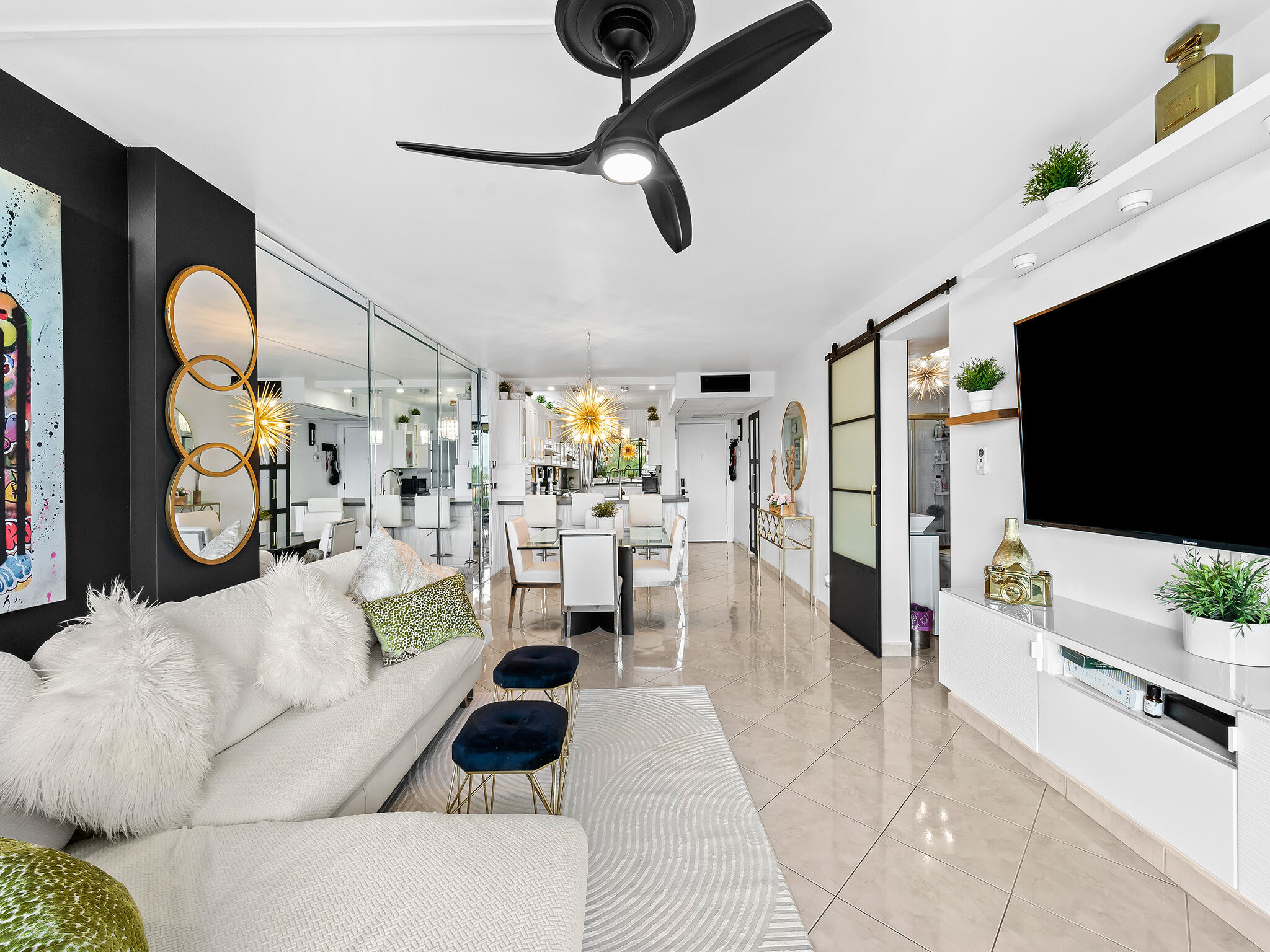 13 Royal Palm Way, Unit 5030 Boca Raton, FL 33432 - Photo 9 of 15 a living room with furniture and a flat screen tv