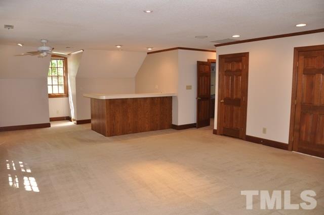 708 Sandown Place Raleigh, NC 27615 - Photo 19 of 25 a view of an empty room with a window